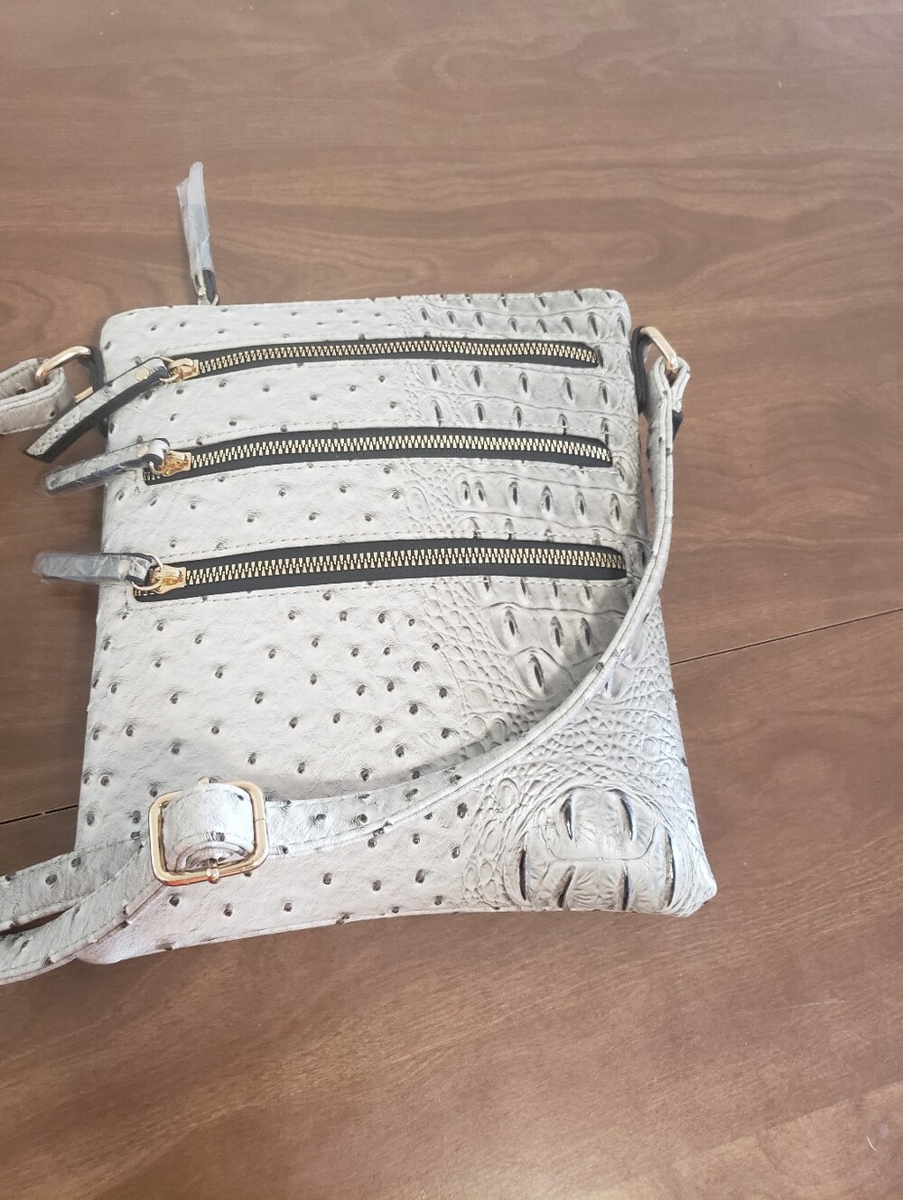 Light Gray Ostrich-Textured Crossbody Bag with Gold Zippers